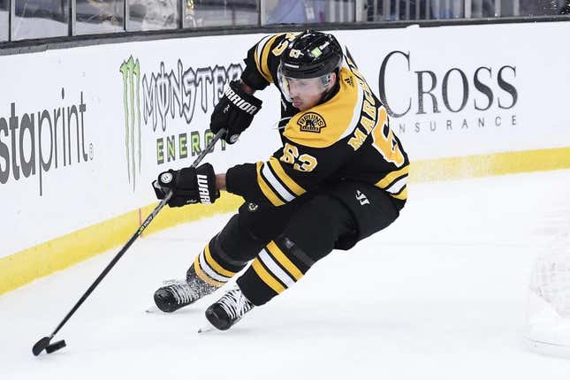 Apr 8, 2023; Boston, Massachusetts, USA;  Boston Bruins left wing Brad Marchand (63) skates with the puck during the third period against the New Jersey Devils at TD Garden.