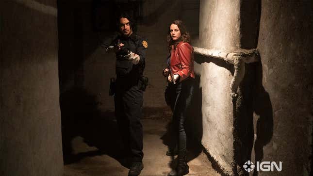 Avan Jogia and Kaya Scodelario aim guns as Leon S. Kennedy and Claire Redfield in Resident Evil: Welcome to Raccoon City.