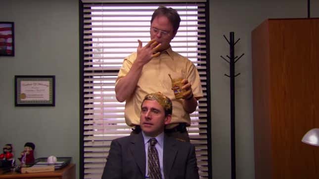 Screenshot from "The Office" Dwight covers Michael's hair in peanut butter