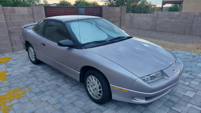 Image for article titled The Cleanest Saturn Coupe You’ve Probably Ever Seen Just Sold On Bring A Trailer