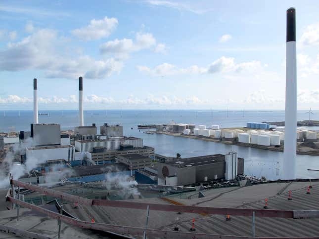 View from the ski slope of Amage Bakker/CopenHill. Wind Turbines dot the waters.