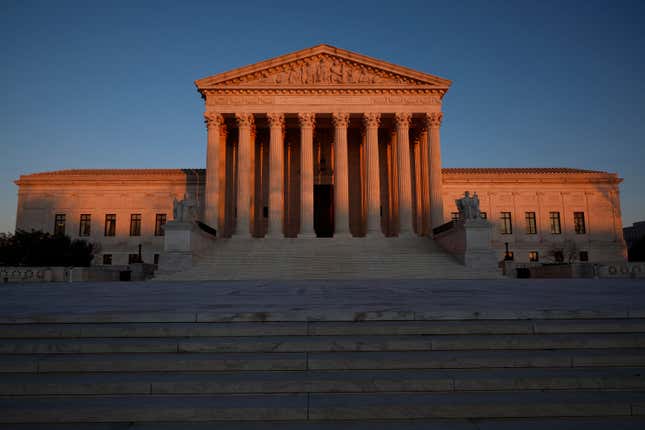The Supreme Court building in the sunrise light