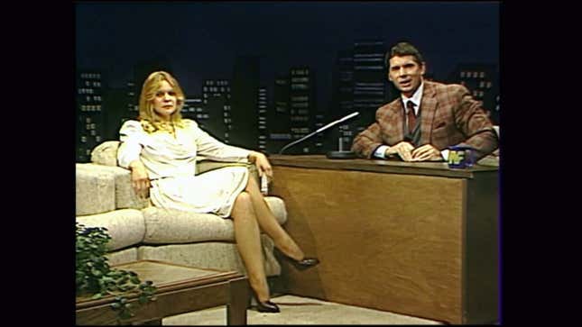  Vince McMahon interviews Rita Chatterton on the professional wrestling talk show, Tuesday Night Titans.