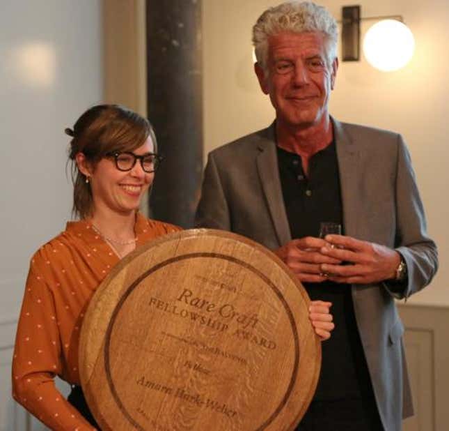 Bourdain with 2017 fellowship winner Amara Hark-Weber