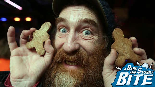 Sinister-looking man holds gingerbread men