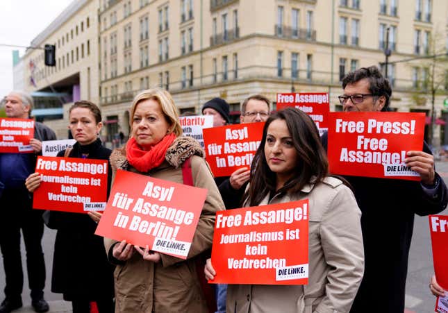 Dieter Dehm (R), Sevim Dagdelen (2-R) and Gesine Loetzsch (3-L) of The Left (Die Linke) party attend a rally calling for the release WikiLeaks founder Julian Assange, close to the embassy of the United Kingdom in Berlin, Germany, 12 April 2019. The President of Ecuador withdrew asylum of Assange, after accusing him of violating international agreements, a special protocol of coexistence and participating in a plot of institutional destabilization. Assange was arrested by British authorities on 11 April 2019. Rally calls for Julian Assange's release in Berlin, Germany - 12 Apr 2019