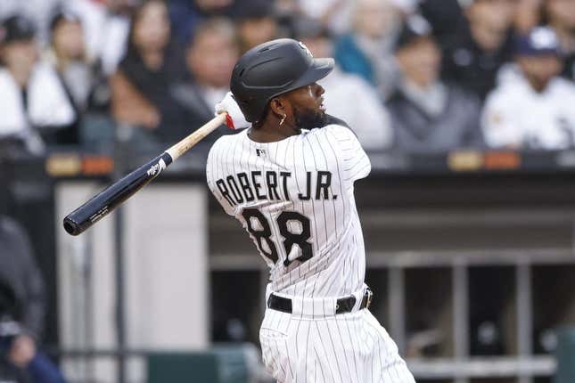 May 13, 2023; Chicago, Illinois, USA; Chicago White Sox center fielder Luis Robert Jr. (88) hits a solo home run against the Houston Astros during the fourth inning at Guaranteed Rate Field.