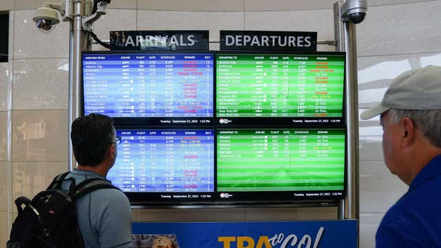 The arrival and departures board lists numerous flight cancelations at Tampa International Airport before the airport is due to close at 5pm today ahead of Hurricane Ian on September 27, 2022 in Tampa, Florida.