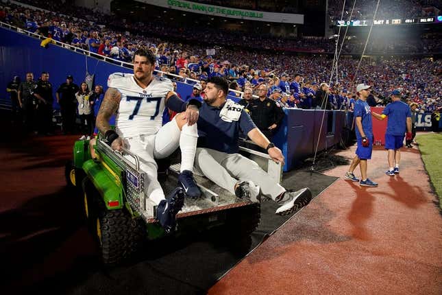 Tennessee Titans offensive tackle Taylor Lewan (77) is helped from the field after getting hurt during the first quarter against the Buffalo Bills at Highmark Stadium Monday, Sept. 19, 2022, in Orchard Park, New York.

Nfl Tennessee Titans At Buffalo Bills