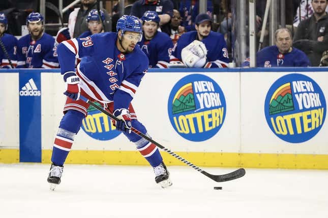 Mar 19, 2023; New York, New York, USA;  New York Rangers defenseman K&#39;Andre Miller (79) controls the puck in the second period against the Nashville Predators at Madison Square Garden.