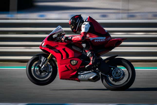 Red Ducati ripping a dank little power wheelie.