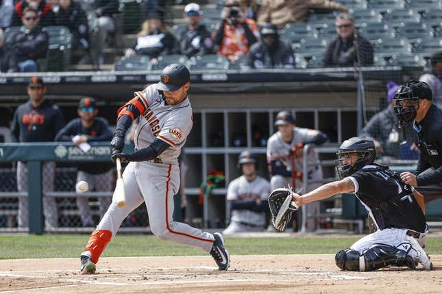 Apr 6, 2023; Chicago, Illinois, USA; San Francisco Giants right fielder Michael Conforto (8) hits a three-run home run against the Chicago White Sox during the first inning at Guaranteed Rate Field.