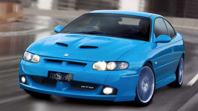 A photo of a blue HSV Coupe sports car. 