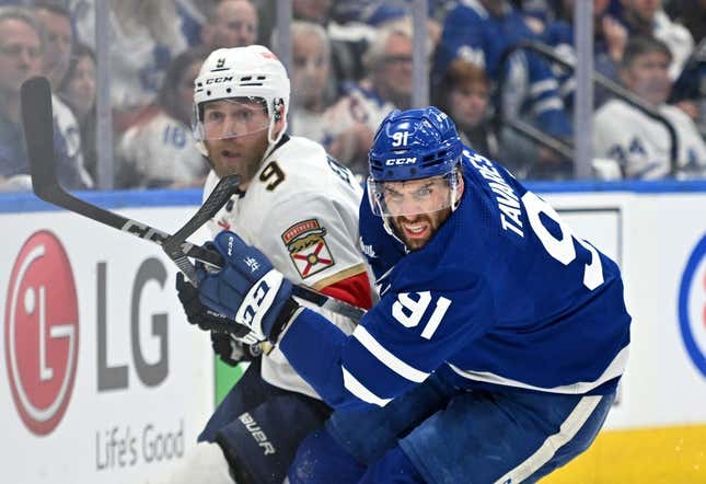 May 12, 2023; Toronto, Ontario, CAN;  Toronto Maple Leafs forward John Tavares (91) pursues the play against Florida Panthers forward Sam Bennett (9) in the first period in game five of the second round of the 2023 Stanley Cup Playoffs at Scotiabank Arena.