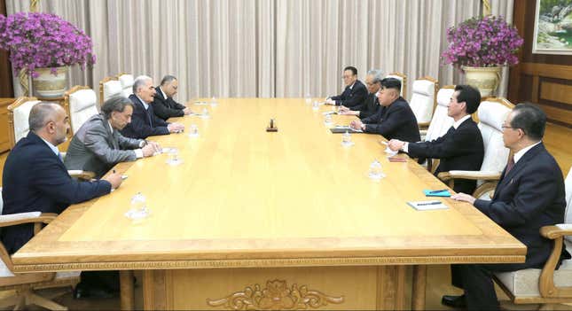 North Korean leader Kim Jong-Un (3rd R) meets with Abdullah al-Ahmar (3rd L), deputy general secretary of the Syria's Baath Arab Socialist Party, who is visiting North Korea to participate in the 60th anniversary of the truce of the Korean War, in this July 24, 2013 photo released by the North Korea's Korean Central News Agency (KCNA) in Pyongyang. Picture taken July 24, 2013.