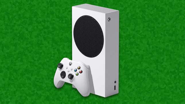 An Xbox Series S sits in front of a green background. 