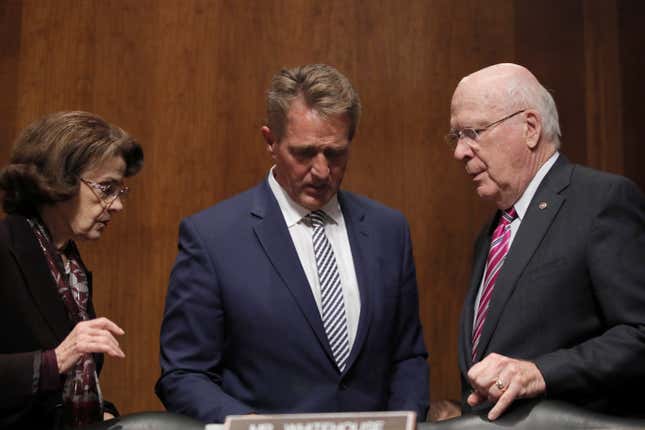 Flake confers with Patrick Leahy and Dianne Feinstein
