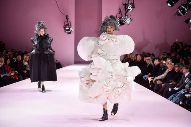 Models wear creations for Comme des Garcons Fall-Winter 2017/2018 ready to wear fashion collection presented Saturday, March 4, 2017 in Paris. (AP Photo/Zacharie Scheurer)