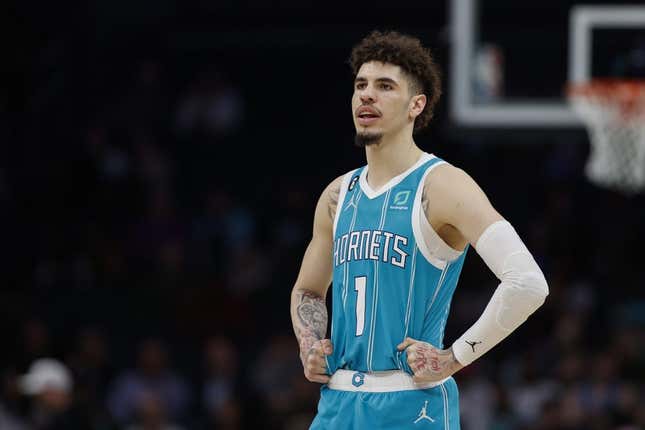 Feb 15, 2023; Charlotte, North Carolina, USA; Charlotte Hornets guard LaMelo Ball (1) stands on the court during the second half against the San Antonio Spurs at Spectrum Center. The Charlotte Hornets won 120-110.