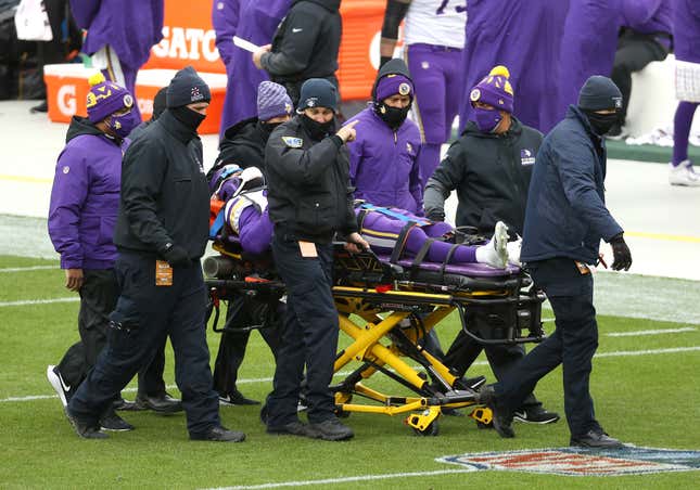 Cameron Dantzler of the Minnesota Vikings is taken off the field after an apparent head injury last season.