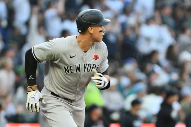 May 29, 2023; Seattle, Washington, USA; New York Yankees right fielder Aaron Judge (99) runs towards first base after hitting a 2-run home run against the Seattle Mariners during the third inning at T-Mobile Park.