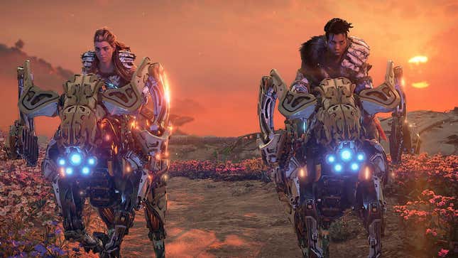 A Horizon Forbidden West image of protagonist Aloy galloping on mecha-horses with a tribe member.