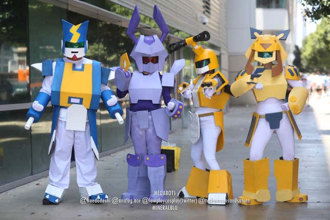 Four Medabot cosplayers at Anime Expo 2023. 