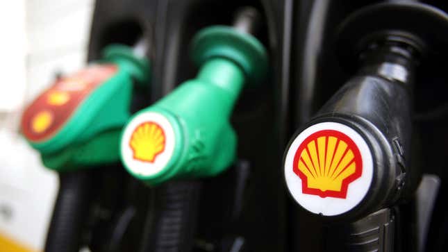 Shell logos on petrol pumps at a petrol station in London.