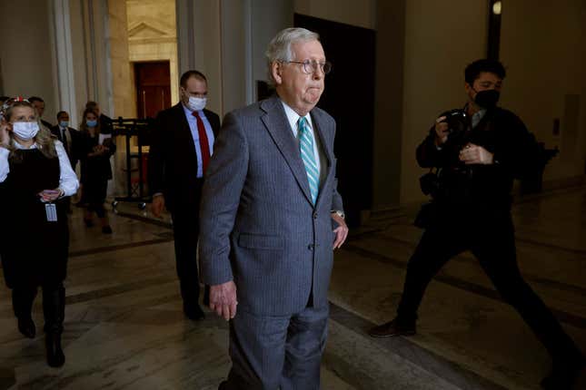 Senate Minority Leader Mitch McConnell (R-KY) leaves following the weekly Senate Republican policy luncheon in the Russell Senate Office Building on Capitol Hill on January 11, 2022, in Washington, DC. 