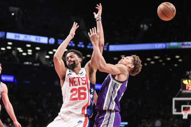 Mar 16, 2023; Brooklyn, New York, USA; Brooklyn Nets guard Spencer Dinwiddie (26) collides with Sacramento Kings forward Kessler Edwards (17) in the fourth quarter at Barclays Center.