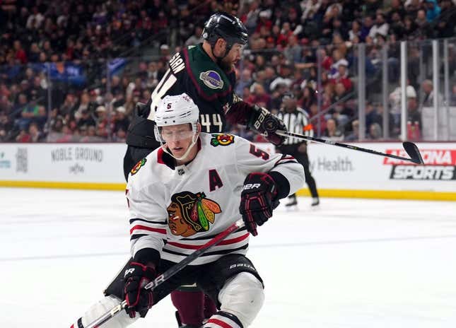 Feb 28, 2023; Tempe, Arizona, USA; Arizona Coyotes right wing Zack Kassian (44) skates against Chicago Blackhawks defenseman Connor Murphy (5) during the second period at Mullett Arena.