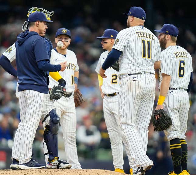 Brewers players meet at the pitching mound as they fall behind the Angels during the seventh inning on Sunday April 30, 2023 at American Family Field in Milwaukee, Wis.