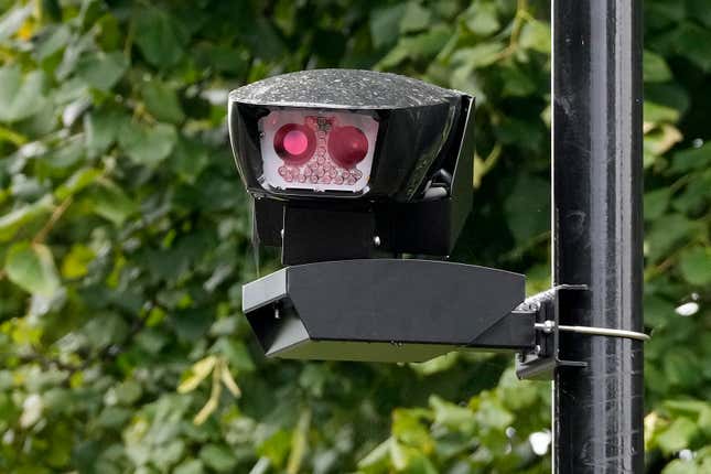 A traffic camera sits on the side of a road leading into the Ultra Low Emission Zone (ULEZ) in London, Thursday, Aug. 24, 2023. London’s traffic cameras are under attack. Police say hundreds of license plate-reading cameras have been damaged, disconnected or stolen by opponents of an anti-pollution charge on older vehicles that comes into force across the metropolis on Tuesday. (AP Photo/Frank Augstein)