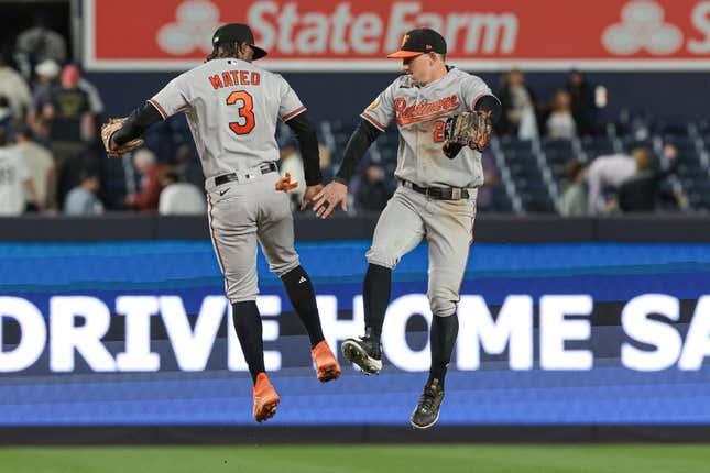 May 24, 2023; Bronx, New York, USA; Baltimore Orioles shortstop Jorge Mateo (3) and left fielder Austin Hays (21) celebrate after defeating the New York Yankees at Yankee Stadium.