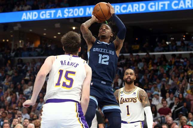 Apr 16, 2023; Memphis, Tennessee, USA; Memphis Grizzlies guard Ja Morant (12) shoots during the second half during game one of the 2023 NBA playoffs against the Los Angeles Lakers at FedExForum.