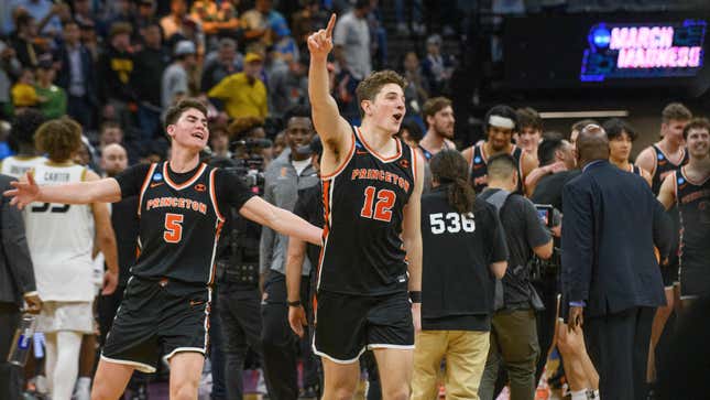 Princeton guard Jack Scott and forward Caden Pierce celebrate the team’s win over Missouri.