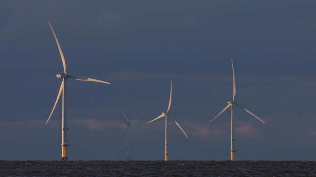 Photo of three offshore wind turbines