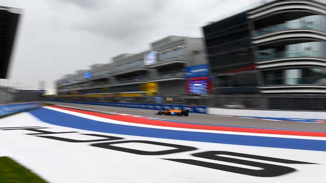 A photo of Lando Norris racing his orange McLaren at the 2021 Russian Grand Prix. 