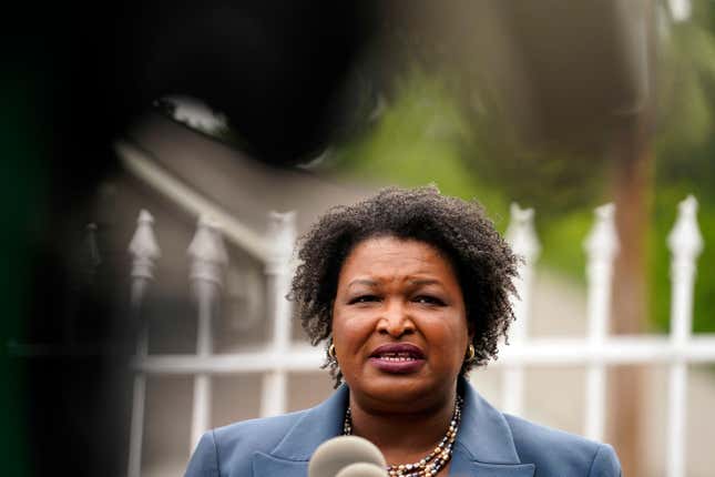 Georgia Democratic gubernatorial candidate Stacey Abrams talks to the media during Georgia’s primary election on Tuesday, May 24, 2022, in Atlanta.