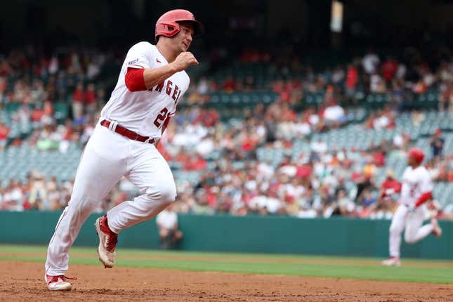 Jul 23, 2023; Anaheim, California, USA; Los Angeles Angels catcher Matt Thaiss (21) runs to a third on RBI double by first baseman Eduardo Escobar (5) during the second inning against the Pittsburgh Pirates at Angel Stadium.