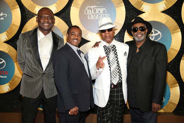 In this Nov. 7, 2014 file photo, George Brown, Ronald Bell, Dennis Thomas and Robert ‘Kool’ Bell of Kool and the Gang arrive during the 2014 Soul Train Awards at the Orleans Arena at The Orleans Hotel &amp; Casino in Las Vegas, Nev. Thomas, a founding member of the long-running soul-funk band Kool &amp; the Gang, has died. Thomas died peacefully in his sleep Saturday, Aug. 7, 2021 in New Jersey, where he was a resident of Montclair.
