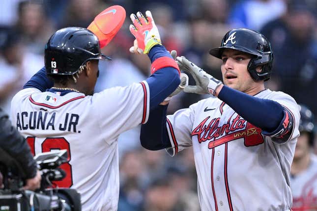 Apr 17, 2023; San Diego, California, USA; Atlanta Braves third baseman Austin Riley (right) is congratulated by right fielder Ronald Acuna (13) after hitting a two-run home run against the San Diego Padres during the first inning at Petco Park.