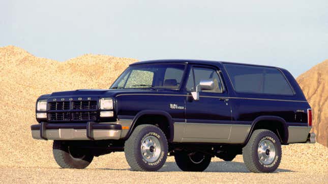 A photo of a dark blue Dodge Ramcharger truck. 