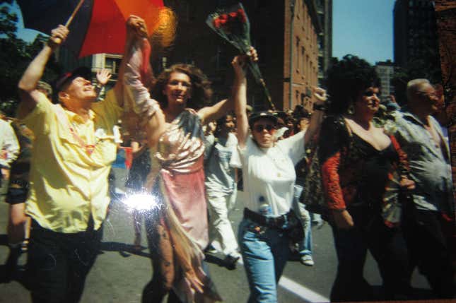 Rose in white top marching with Randy Wicker in yellow and Sylvia Rivera in pink