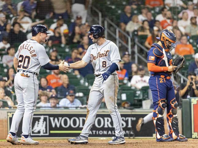 Apr 3, 2023; Houston, Texas, USA; Detroit Tigers first baseman Spencer Torkelson (20) celebrates right fielder Matt Vierling (8) two-run home run against the Houston Astros in the eleventh inning at Minute Maid Park.