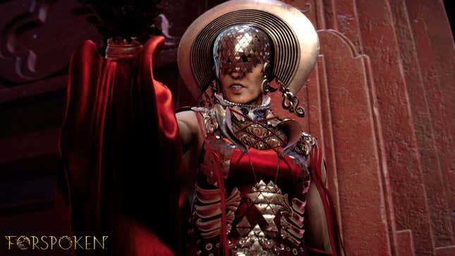 The gold armor and silky red robes from Tanta Sila shine brilliantly as she gestures in front of a red stone wall.