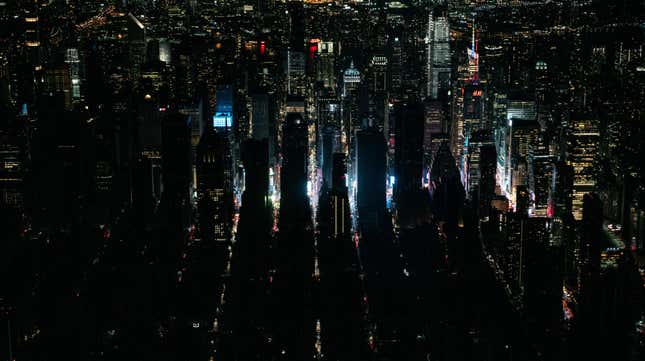 A large section of Manhattan’s Upper West Side and Midtown neighborhoods are seen in darkness from above during a major power outage on July 13, 2019 in New York City. 
