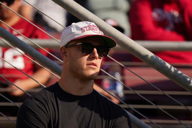 STANFORD, CALIFORNIA - SEPTEMBER 23: Christian McCaffrey of the San Francisco 49ers watches the game between the Arizona Wildcats and Stanford Cardinal at Stanford Stadium on September 23, 2023 in Stanford, California. (Photo by Loren Elliott/Getty Images)