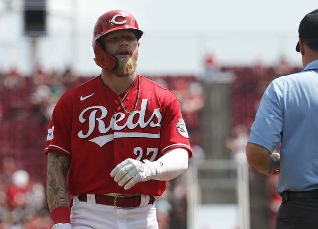 Jul 23, 2023; Cincinnati, Ohio, USA; Cincinnati Reds center fielder Jake Fraley (27) walks from third base after being tagged out against the Arizona Diamondbacks during the sixth inning at Great American Ball Park.