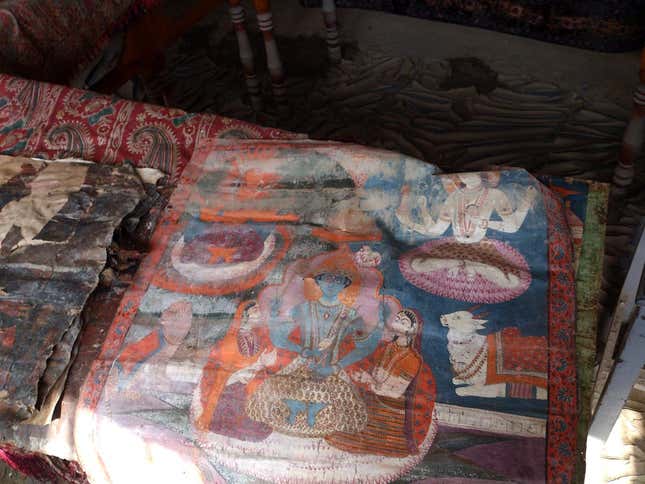 Damaged Ram Durbar painting with gold paint.